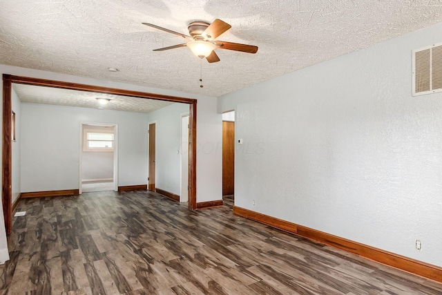 2584 E 5th Ave, Columbus, OH 43219 - unfurnished room with wood finished floors, ceiling fan, and a textured ceiling