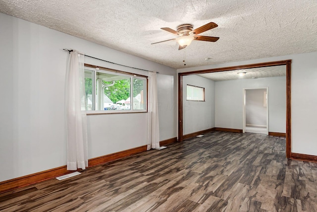 2584 E 5th Ave, Columbus, OH 43219 - spare room with wood finished floors, a ceiling fan, and a textured ceiling