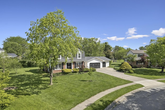 4188 Gavin Ln, Upper Arlington, OH 43220 - view of front of house featuring an attached garage, a front yard, and concrete driveway