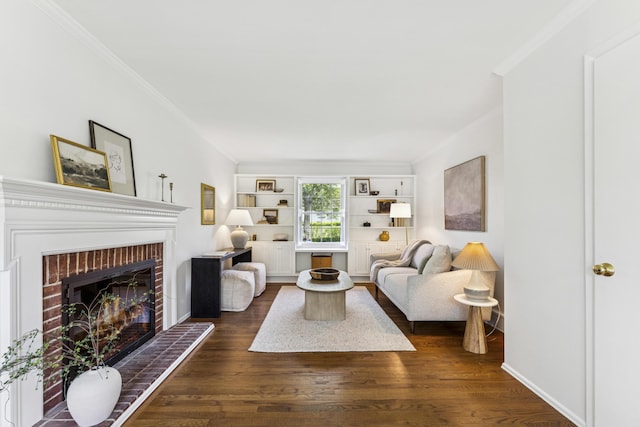 4188 Gavin Ln, Upper Arlington, OH 43220 - living room featuring ornamental molding, dark wood finished floors, and a brick fireplace