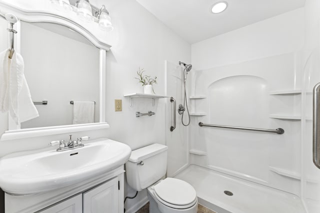 4188 Gavin Ln, Upper Arlington, OH 43220 - bathroom with a shower, vanity, toilet, and recessed lighting