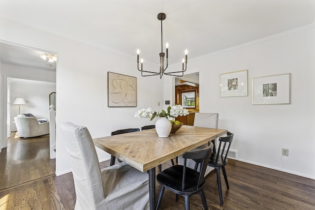4188 Gavin Ln, Upper Arlington, OH 43220 - dining room featuring a chandelier, dark wood-style floors, ornamental molding, and baseboards