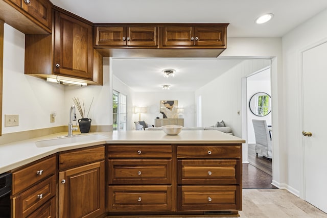 4188 Gavin Ln, Upper Arlington, OH 43220 - kitchen featuring a sink, a peninsula, light countertops, open floor plan, and an office area