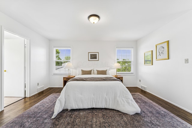 4188 Gavin Ln, Upper Arlington, OH 43220 - bedroom featuring multiple windows, wood finished floors, and baseboards