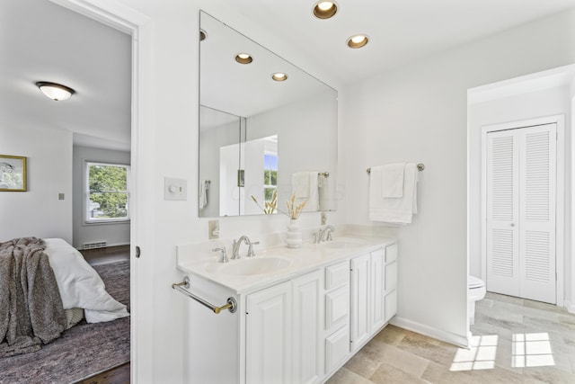 4188 Gavin Ln, Upper Arlington, OH 43220 - full bathroom with ensuite bath, recessed lighting, double vanity, baseboards, and a closet
