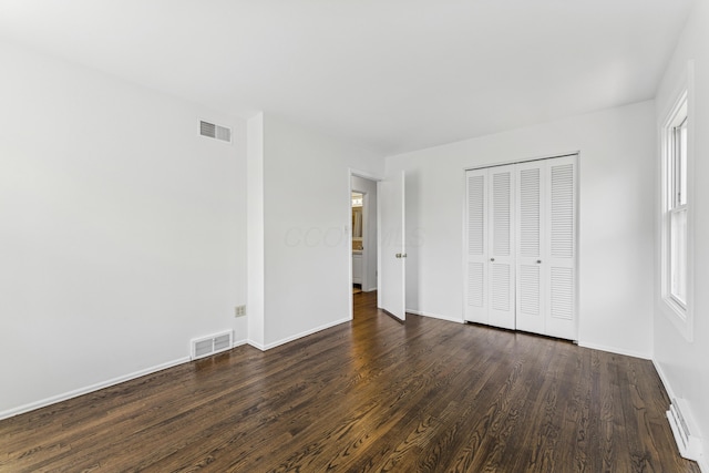 4188 Gavin Ln, Upper Arlington, OH 43220 - unfurnished bedroom featuring wood finished floors, baseboards, and a closet
