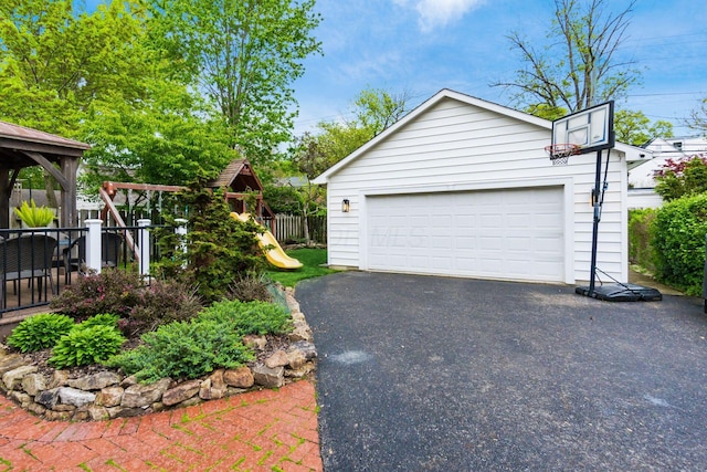 detached garage with fence