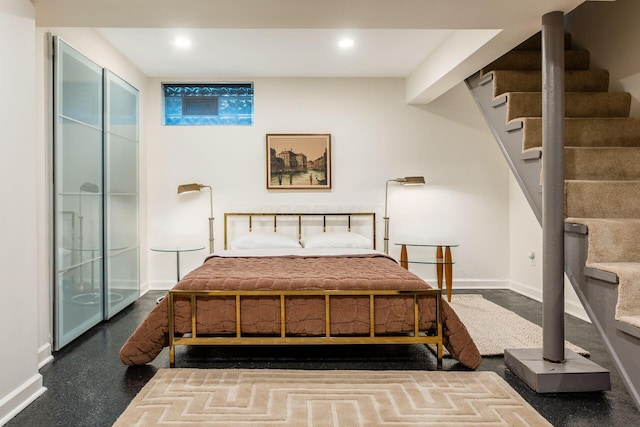 bedroom featuring baseboards and recessed lighting
