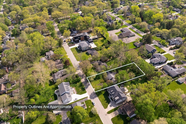 aerial view of residential area with property parcel outlined