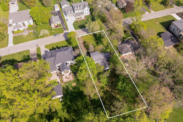 aerial view of residential area with property boundaries highlighted