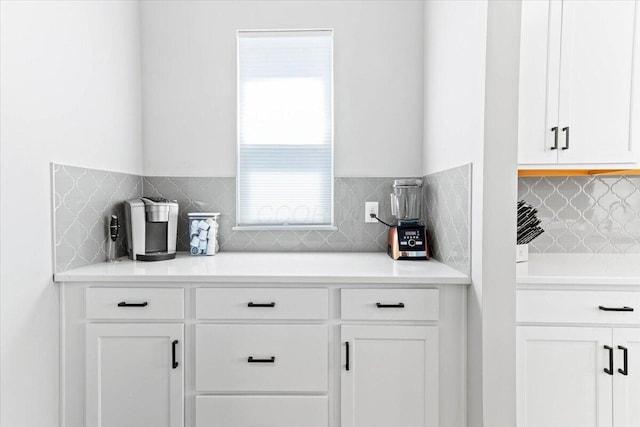 9129 Coe Dr, Plain City, OH 43064 - bar area featuring tasteful backsplash