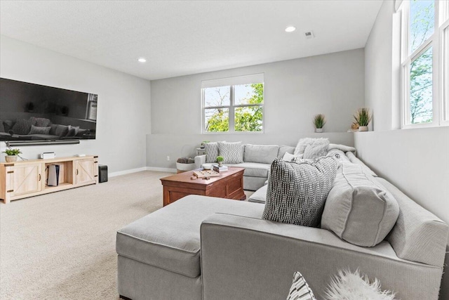 9129 Coe Dr, Plain City, OH 43064 - carpeted living room with recessed lighting and baseboards