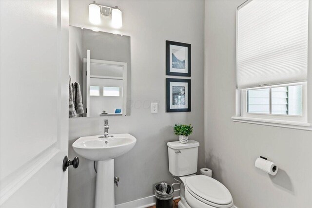 9129 Coe Dr, Plain City, OH 43064 - half bathroom with toilet and baseboards