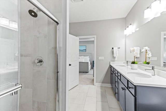 9129 Coe Dr, Plain City, OH 43064 - full bath featuring a shower stall, ensuite bath, double vanity, tile patterned flooring, and baseboards