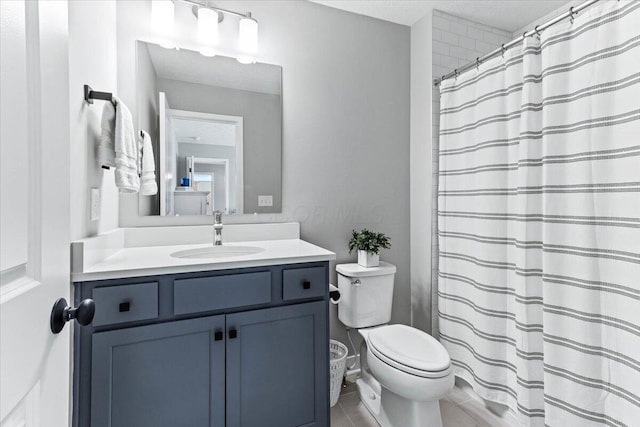 9129 Coe Dr, Plain City, OH 43064 - full bathroom with toilet, vanity, tile patterned flooring, and a shower with shower curtain