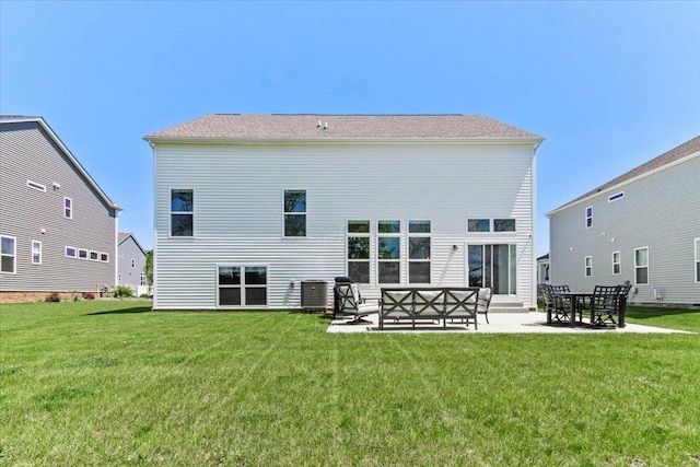 9129 Coe Dr, Plain City, OH 43064 - rear view of property with a patio area, a lawn, and central air condition unit