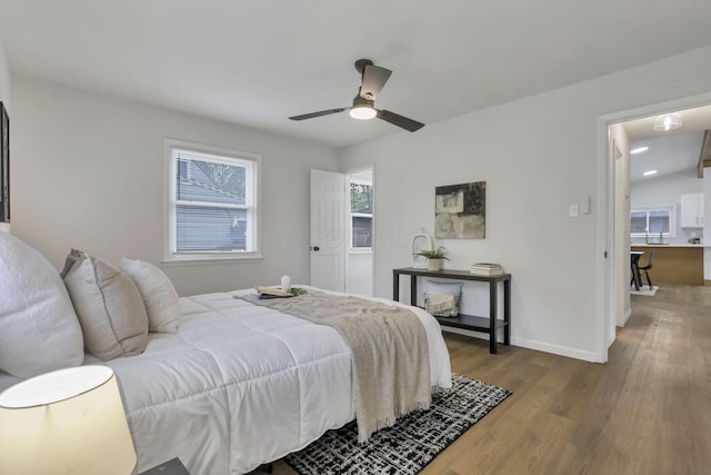 4502 Aragon Ave, Columbus, OH 43227 - bedroom with ceiling fan, baseboards, and wood finished floors