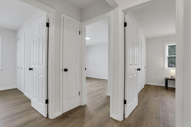 4502 Aragon Ave, Columbus, OH 43227 - hall with baseboards and wood finished floors