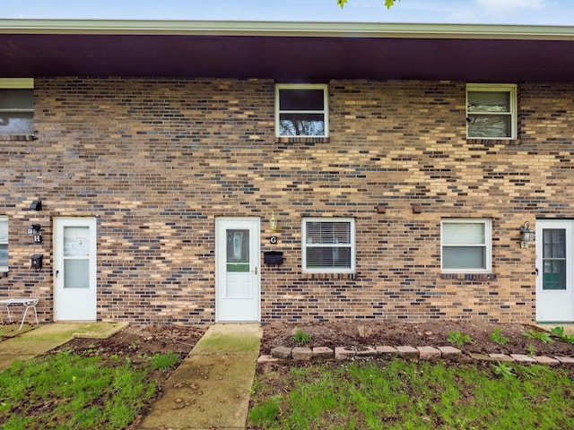view of front of house with brick siding