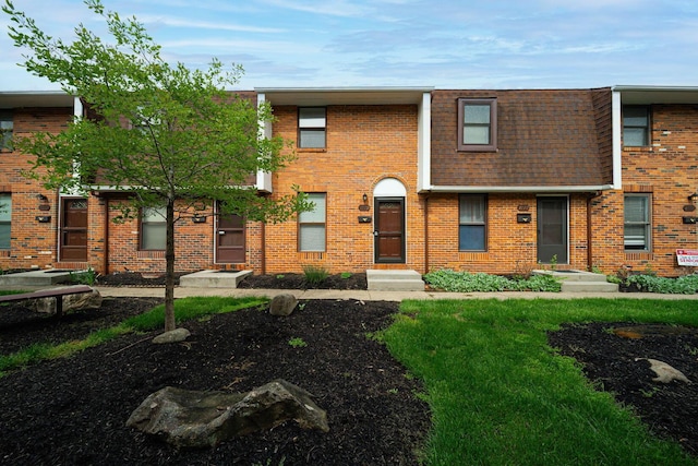 1779 Willoway Cir N, Columbus, OH 43220 - multi unit property with brick siding, a shingled roof, and mansard roof