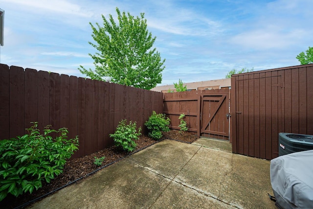 1779 Willoway Cir N, Columbus, OH 43220 - view of patio / terrace with a gate, a fenced backyard, and cooling unit