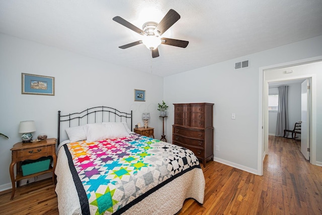 1779 Willoway Cir N, Columbus, OH 43220 - bedroom with wood finished floors, baseboards, and ceiling fan