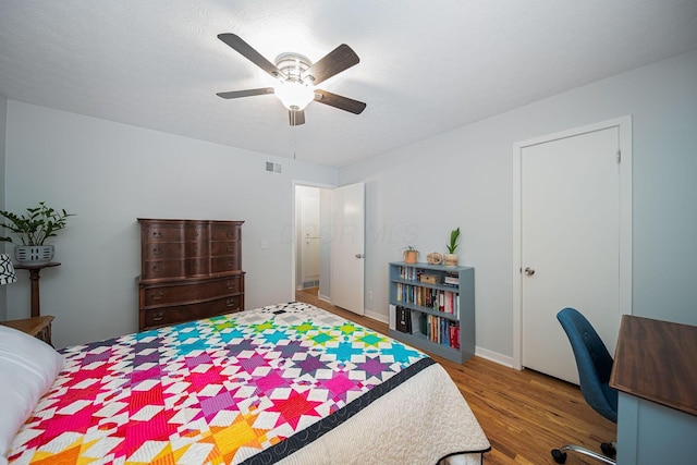 1779 Willoway Cir N, Columbus, OH 43220 - bedroom with wood finished floors, a ceiling fan, and baseboards