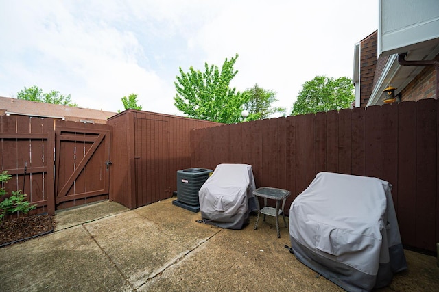 1779 Willoway Cir N, Columbus, OH 43220 - view of patio / terrace featuring a gate, central AC, fence, and a grill