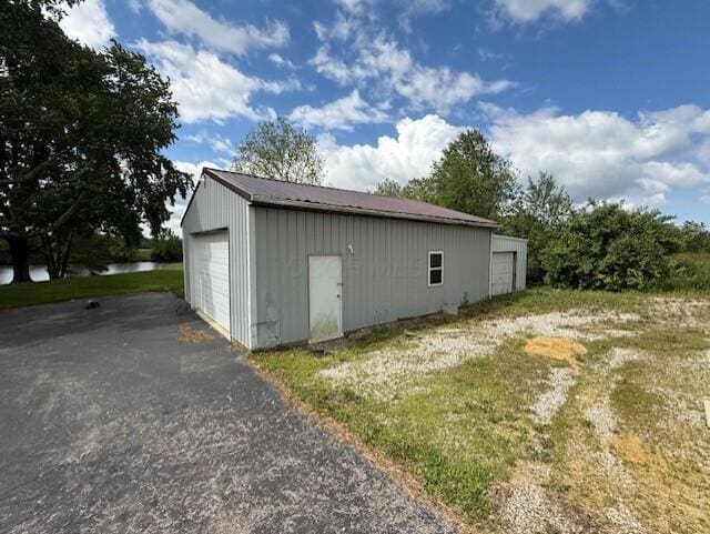 8165 Busey Rd, Pickerington, OH 43147 - view of outdoor structure featuring a water view