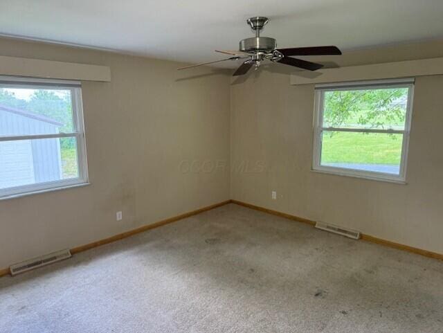 8165 Busey Rd, Pickerington, OH 43147 - carpeted empty room featuring ceiling fan and baseboards