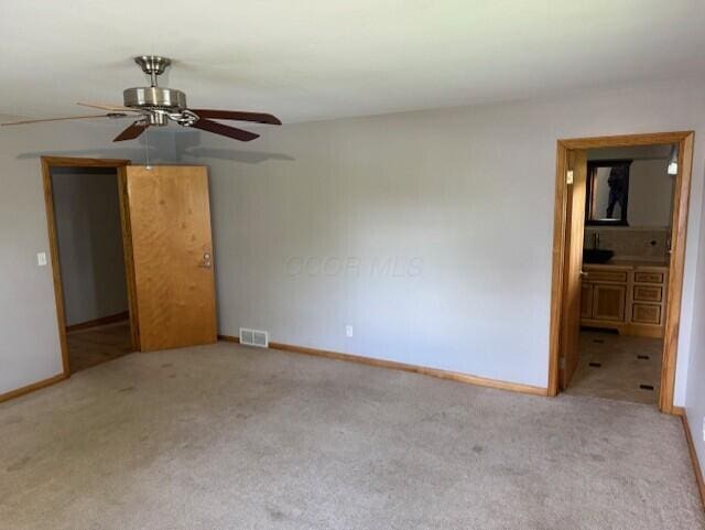 8165 Busey Rd, Pickerington, OH 43147 - carpeted empty room with ceiling fan and baseboards