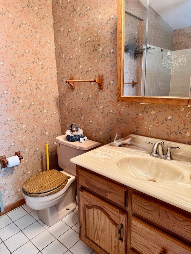 6 Oakwood Dr, Chillicothe, OH 45601 - full bathroom with wallpapered walls, toilet, tile patterned floors, vanity, and tiled shower