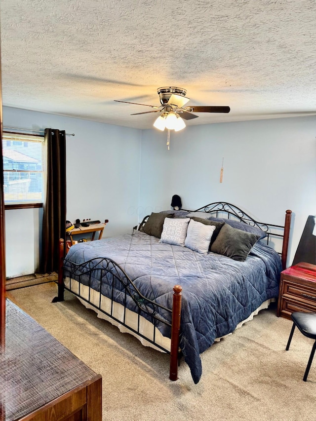 6 Oakwood Dr, Chillicothe, OH 45601 - bedroom featuring carpet floors, ceiling fan, and a textured ceiling