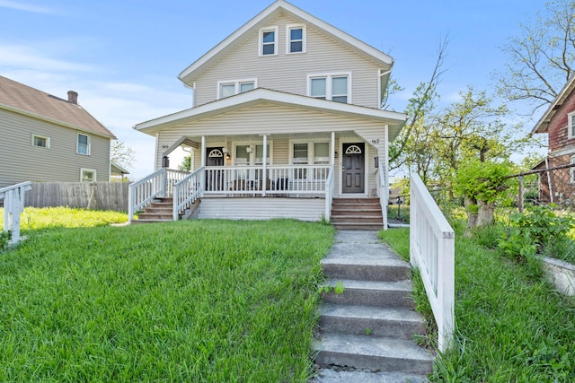 traditional style home with a porch and stairway