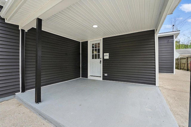 property entrance with fence