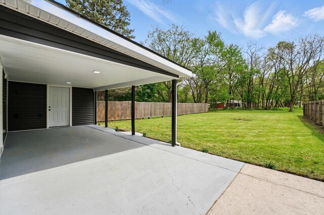 view of patio / terrace featuring fence