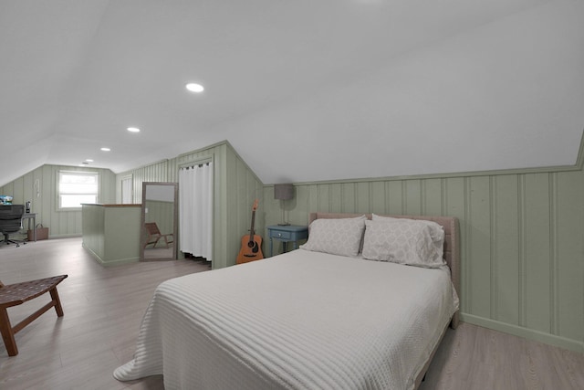 591 French Dr, Columbus, OH 43228 - bedroom featuring vaulted ceiling, wood finished floors, and recessed lighting