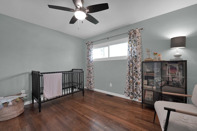 591 French Dr, Columbus, OH 43228 - bedroom with wood finished floors, baseboards, and ceiling fan