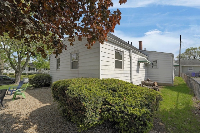 591 French Dr, Columbus, OH 43228 - view of property exterior with a chimney