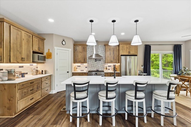 659 Natchez Ln, Sugar Grove, OH 43155 - kitchen featuring appliances with stainless steel finishes, wall chimney exhaust hood, decorative backsplash, light countertops, and recessed lighting
