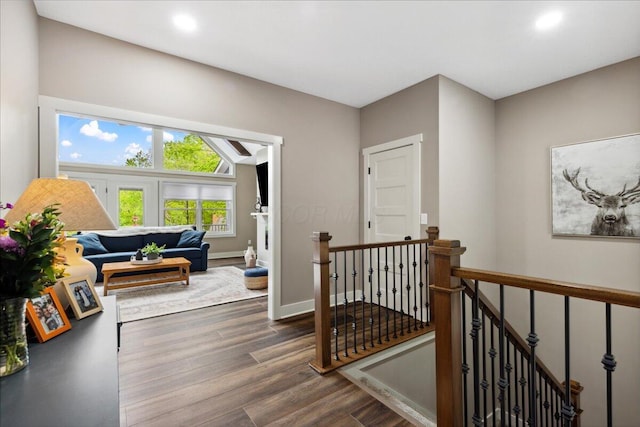 659 Natchez Ln, Sugar Grove, OH 43155 - hall featuring an upstairs landing, dark wood-style floors, recessed lighting, and baseboards