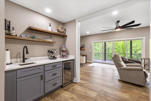 659 Natchez Ln, Sugar Grove, OH 43155 - indoor bar featuring wine cooler, light wood-style flooring, ceiling fan, baseboards, and recessed lighting