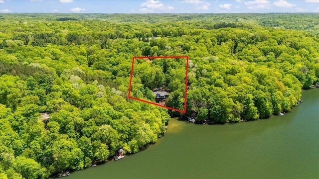 659 Natchez Ln, Sugar Grove, OH 43155 - aerial view of property and surrounding area featuring a heavily wooded area, a large body of water, and property boundaries highlighted