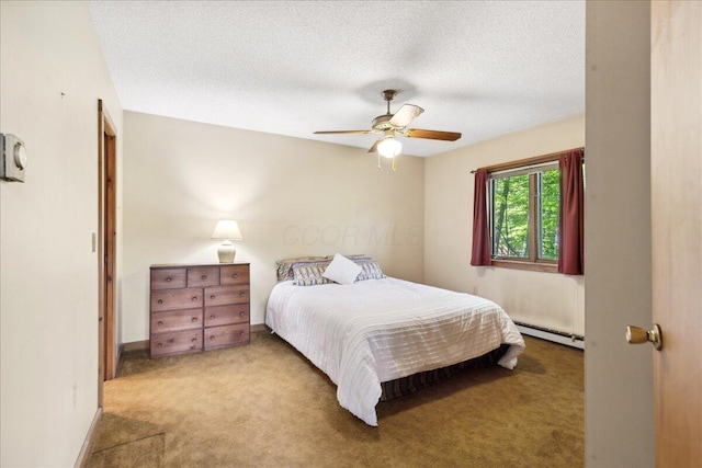 259 Shawnee Ln Unit L, Sugar Grove, OH 43155 - carpeted bedroom with a baseboard radiator, ceiling fan, a textured ceiling, and baseboards