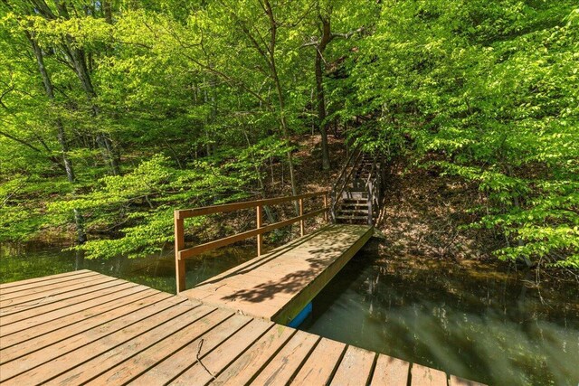 259 Shawnee Ln Unit L, Sugar Grove, OH 43155 - dock with stairway and a water view