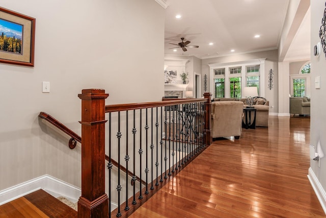 5464 Slater Rdg, Westerville, OH 43082 - staircase featuring crown molding, baseboards, hardwood / wood-style flooring, a ceiling fan, and recessed lighting