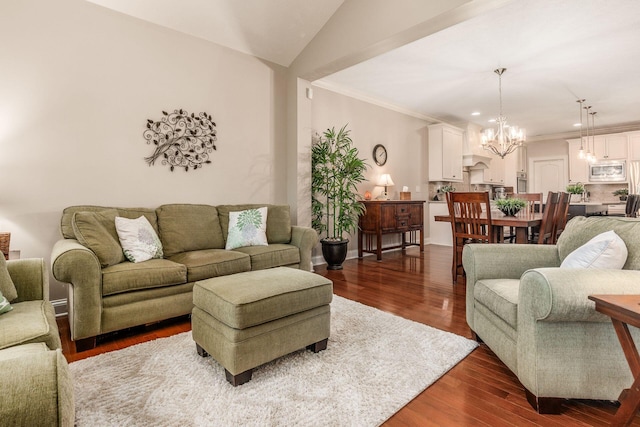 5464 Slater Rdg, Westerville, OH 43082 - living room with a chandelier, wood finished floors, ornamental molding, recessed lighting, and lofted ceiling