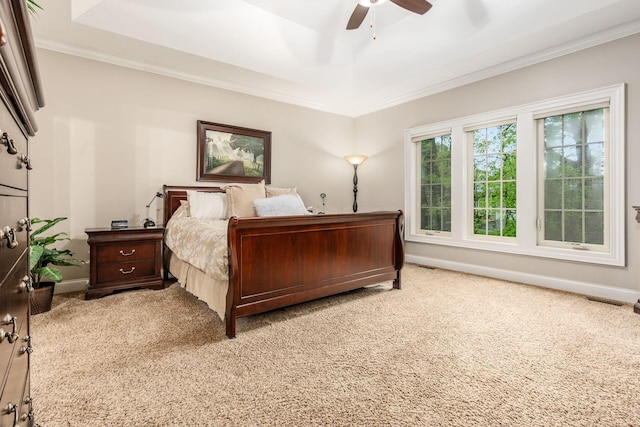 5464 Slater Rdg, Westerville, OH 43082 - carpeted bedroom with baseboards, ornamental molding, a tray ceiling, and a ceiling fan
