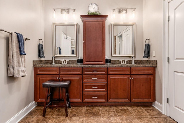 5464 Slater Rdg, Westerville, OH 43082 - bathroom featuring double vanity and baseboards