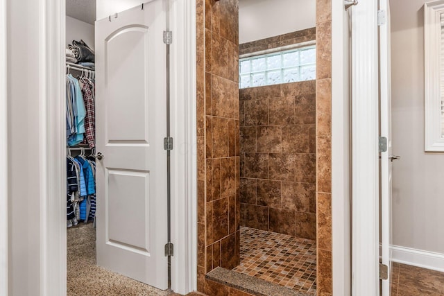 5464 Slater Rdg, Westerville, OH 43082 - full bath featuring a stall shower, a spacious closet, and baseboards